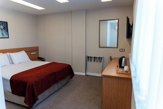 Imagen de la habitación del THE MU CITY HOTEL. Foto 4
