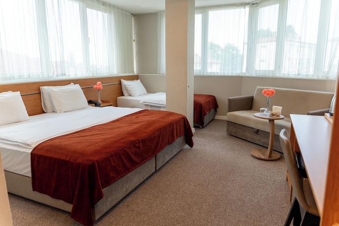 Imagen de la habitación del THE MU CITY HOTEL. Foto 5
