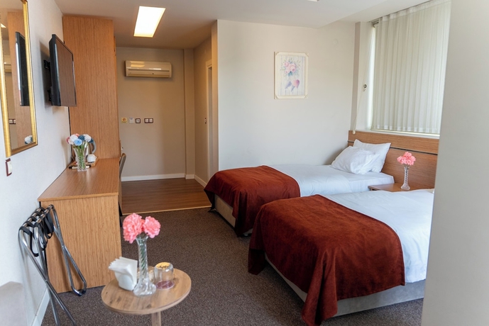 Imagen de la habitación del THE MU CITY HOTEL. Foto 6