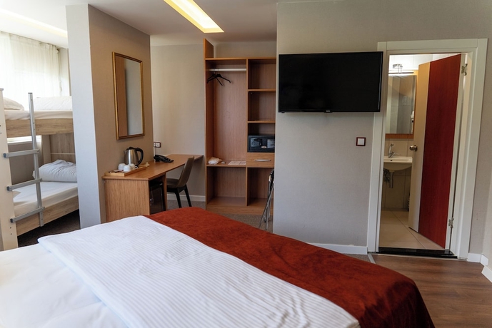 Imagen de la habitación del THE MU CITY HOTEL. Foto 9