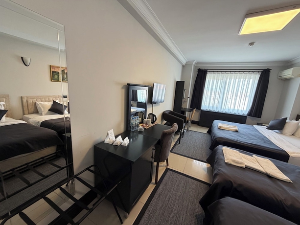 Imagen de la habitación del THE ONE HOTEL. Foto 3