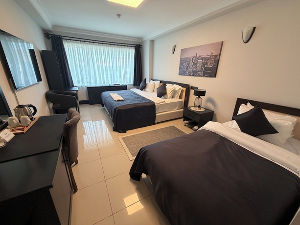 Imagen de la habitación del THE ONE HOTEL. Foto 4