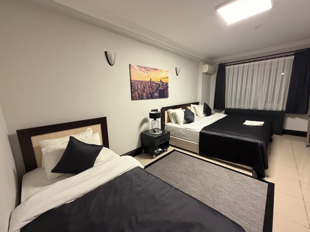 Imagen de la habitación del THE ONE HOTEL. Foto 5