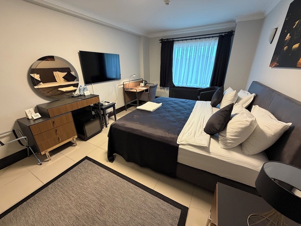 Imagen de la habitación del THE ONE HOTEL. Foto 7
