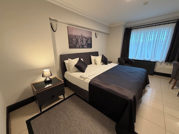 Imagen de la habitación del THE ONE HOTEL. Foto 9