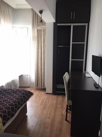 Imagen de la habitación del THE ROSE OTEL. Foto 7