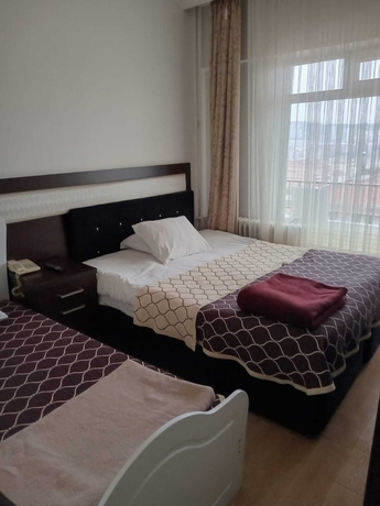 Imagen de la habitación del THE ROSE OTEL. Foto 11