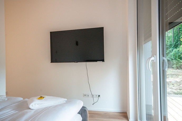 Imagen de la habitación del THE WOS Apartments. Foto 12