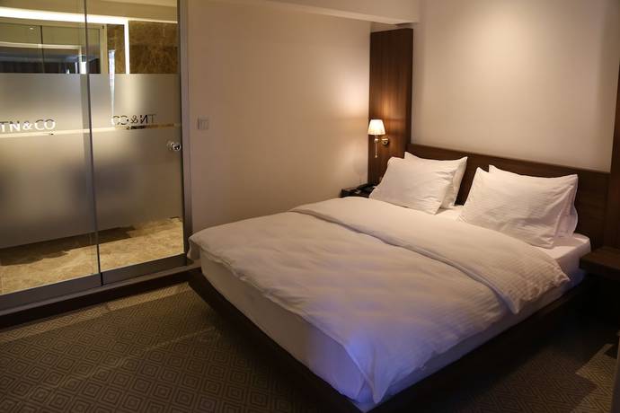 Imagen de la habitación del TN and CO Hotel. Foto 12