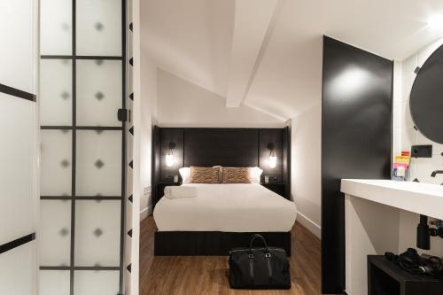 Imagen de la habitación del TOC Hostel Malaga. Foto 19