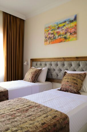 Imagen de la habitación del TROİADA OTEL. Foto 15