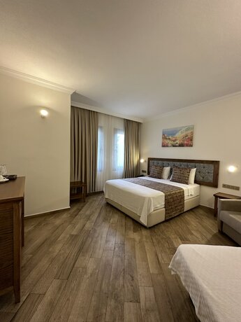 Imagen de la habitación del TROİADA OTEL. Foto 16