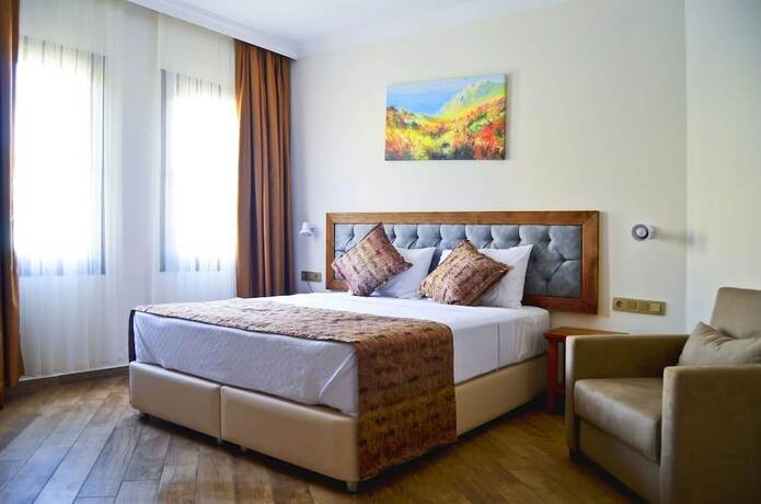 Imagen de la habitación del TROİADA OTEL. Foto 17