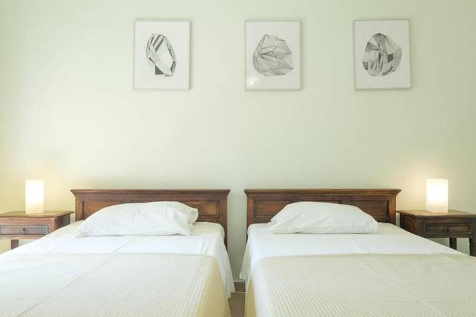 Imagen de la habitación del TROCHALO VILLAS. Foto 11