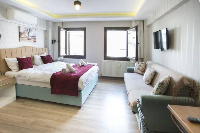 Imagen de la habitación del T-Square Residence. Foto 12