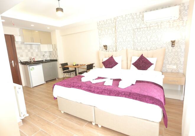 Imagen de la habitación del T-Square Residence. Foto 13