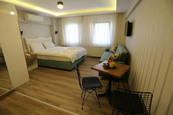 Imagen de la habitación del T-Square Residence. Foto 15