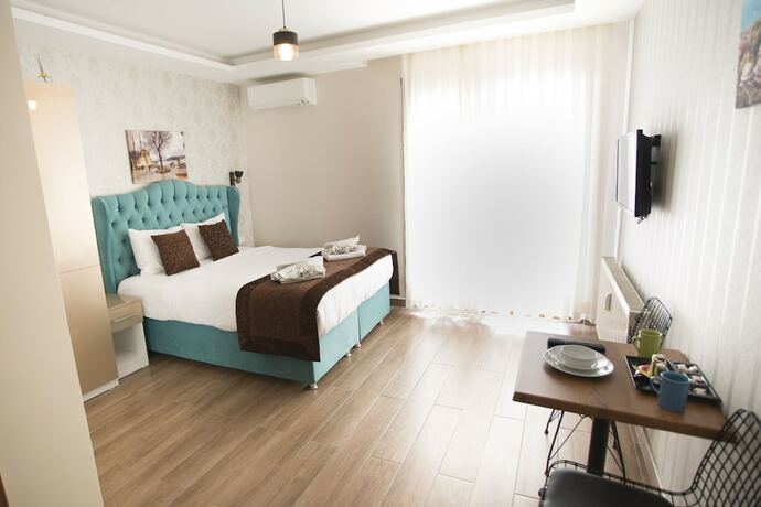 Imagen de la habitación del T-Square Residence. Foto 16