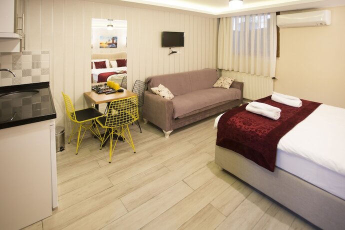 Imagen de la habitación del T-Square Residence. Foto 17