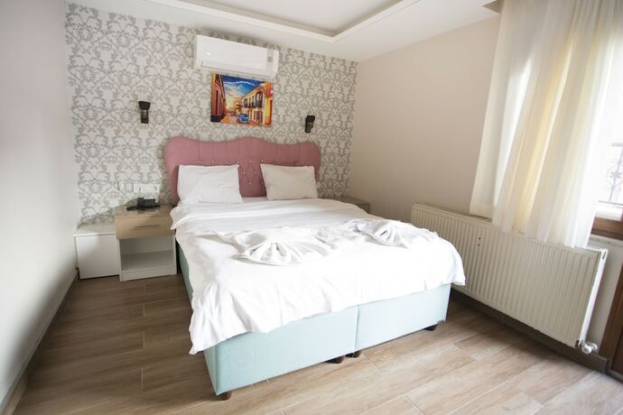 Imagen de la habitación del T-Square Residence. Foto 18