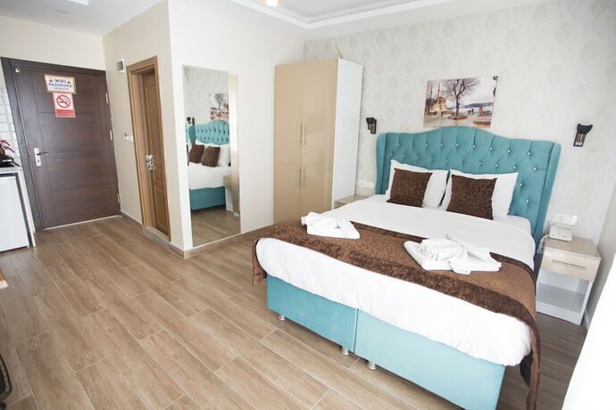 Imagen de la habitación del T-Square Residence. Foto 19