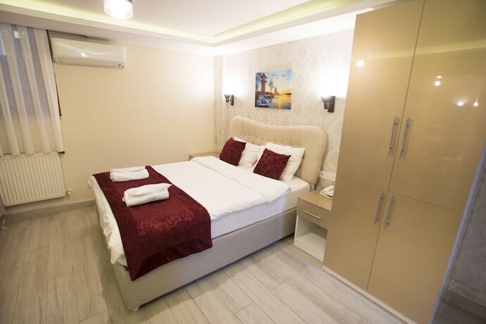 Imagen de la habitación del T-Square Residence. Foto 20
