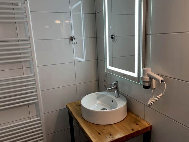 Imagen de la habitación del TaT Hotel. Foto 12