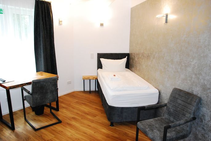 Imagen de la habitación del TaT Hotel. Foto 19