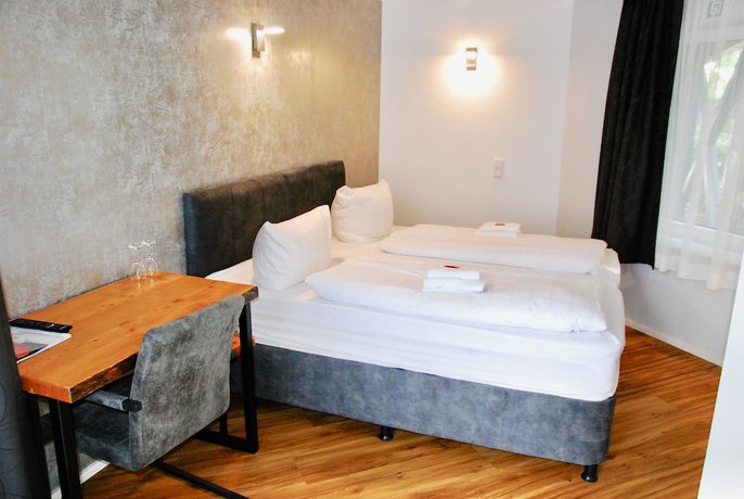 Imagen de la habitación del TaT Hotel. Foto 20