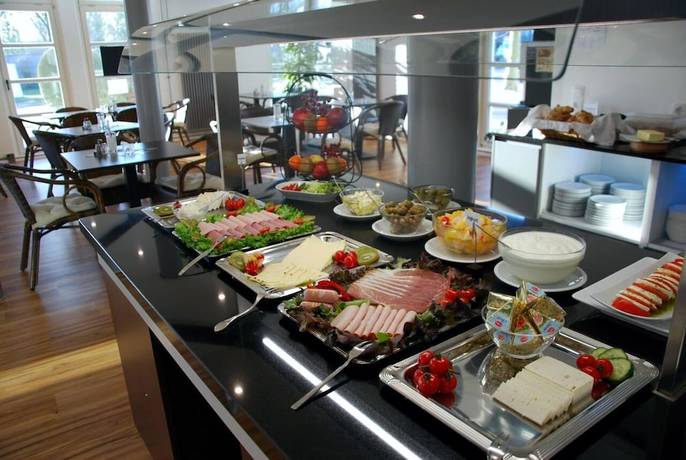 Imagen del bar/restaurante del TaT Hotel. Foto 3