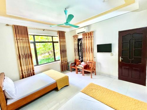 Imagen de la habitación del T&acirc;n Tiến Hotel. Foto 17