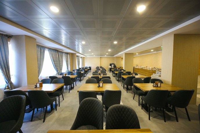 Imagen del bar/restaurante del Taht Palace Hotel. Foto 2