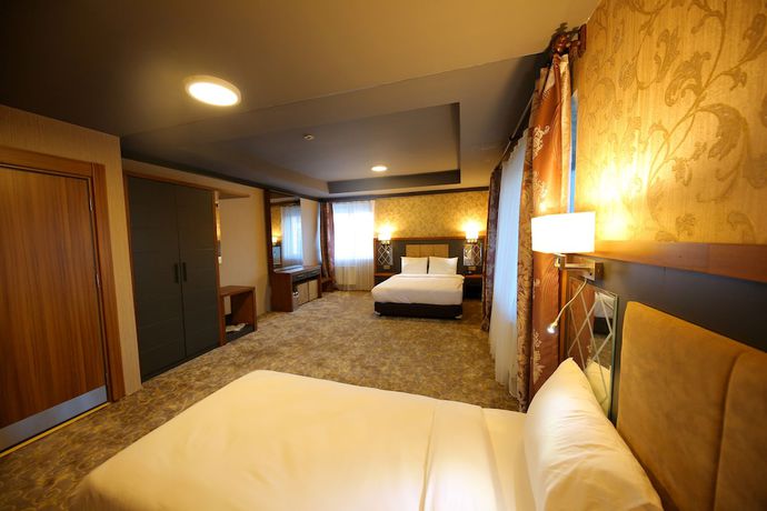 Imagen de la habitación del Taht Palace Hotel. Foto 9