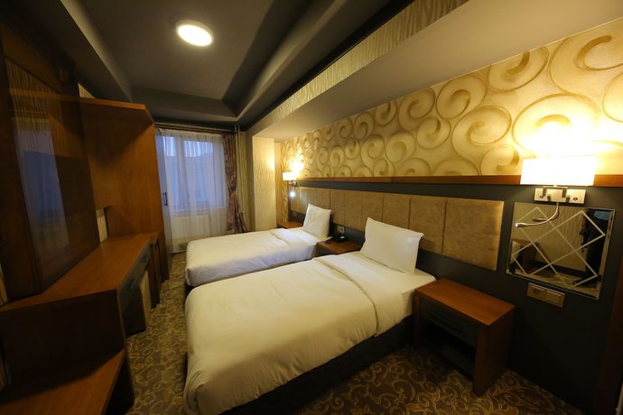 Imagen de la habitación del Taht Palace Hotel. Foto 10