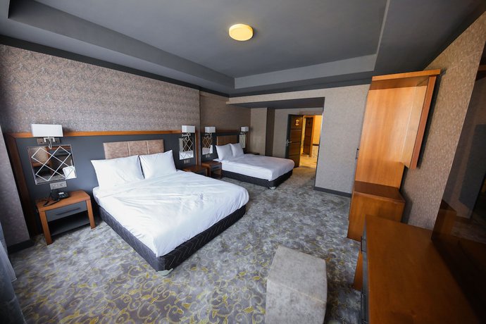 Imagen de la habitación del Taht Palace Hotel. Foto 15