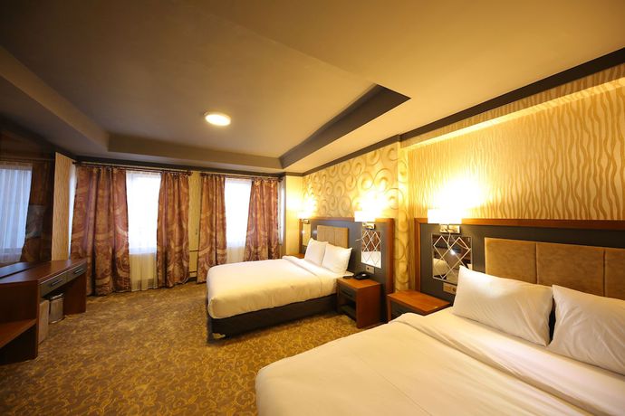 Imagen de la habitación del Taht Palace Hotel. Foto 16