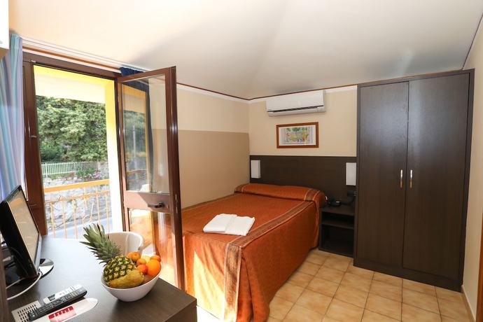 Imagen de la habitación del Taki Village Hotel. Foto 4