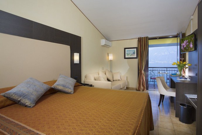Imagen de la habitación del Taki Village Hotel. Foto 11
