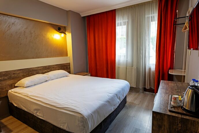 Imagen de la habitación del Taşkın Hotel. Foto 19