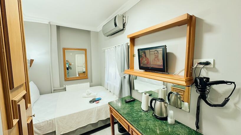 Imagen de la habitación del Taksim Centre Hotel. Foto 18