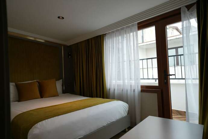 Imagen de la habitación del Taksim La Marino Hotel. Foto 12