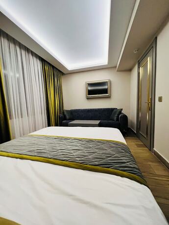 Imagen de la habitación del Taksim La Marino Hotel. Foto 15