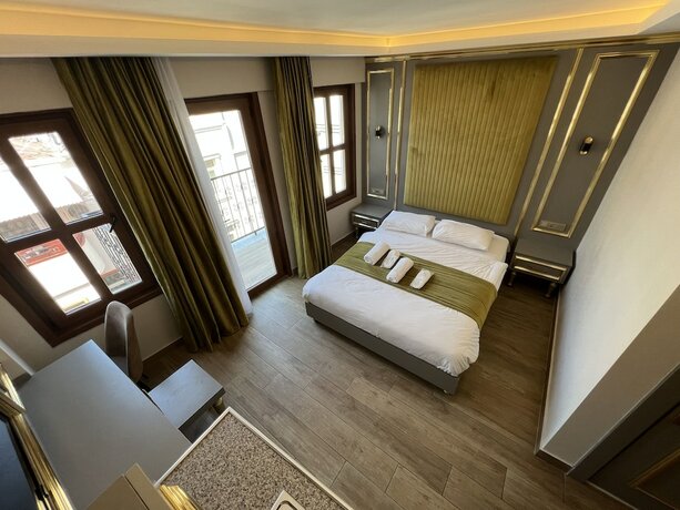 Imagen de la habitación del Taksim La Marino Hotel. Foto 19