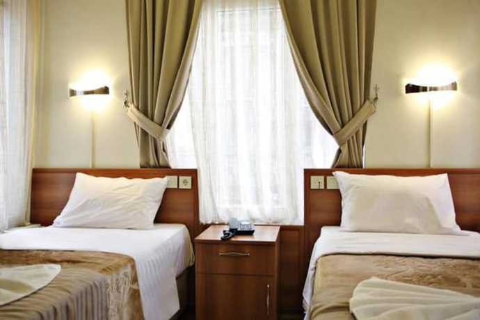 Imagen de la habitación del Taksim Palace Hotel. Foto 6