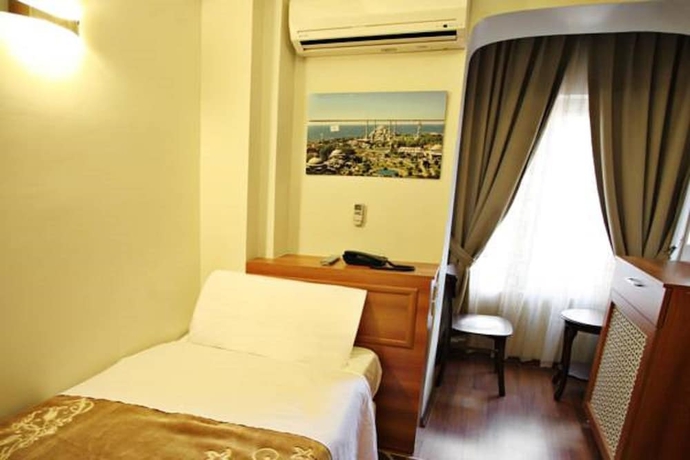 Imagen de la habitación del Taksim Palace Hotel. Foto 7
