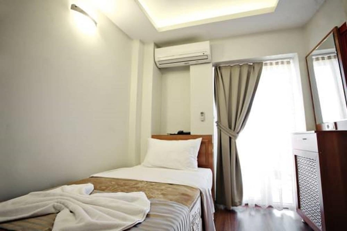 Imagen de la habitación del Taksim Palace Hotel. Foto 8