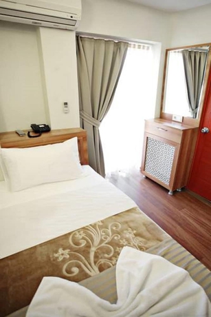 Imagen de la habitación del Taksim Palace Hotel. Foto 14