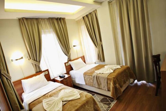 Imagen de la habitación del Taksim Palace Hotel. Foto 16