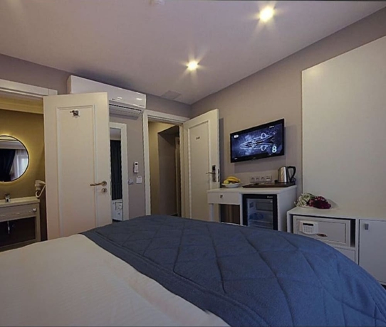 Imagen de la habitación del Taksim Santa Lucia Hotel. Foto 8