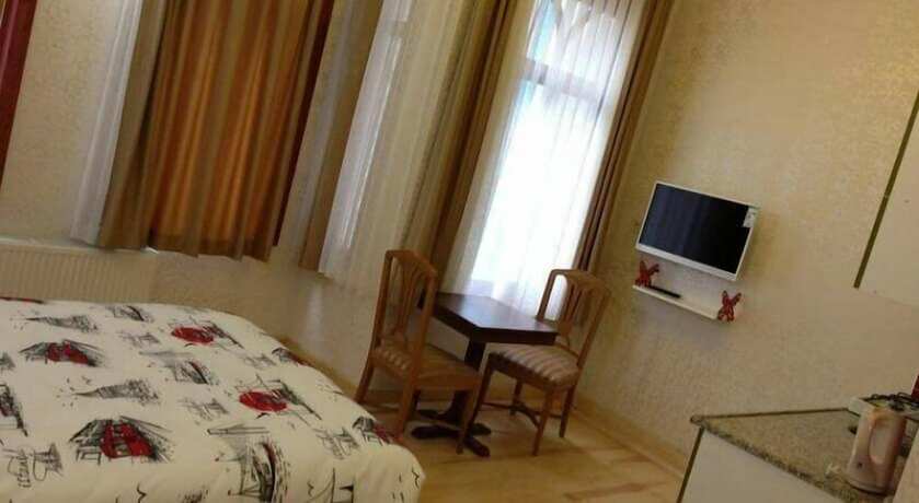 Imagen de la habitación del Taksimparis Apartments. Foto 17